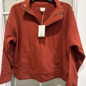 A New Day half-zip pull-over sweater, size M; brand new.